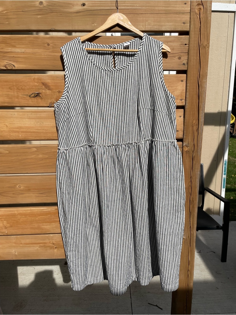 Sleeveless Black and White Striped Midi Dress with Gathered Waist